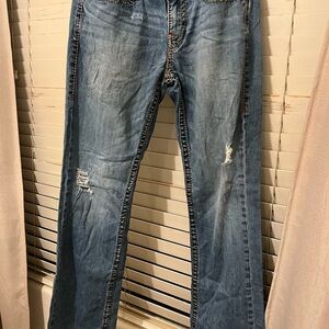 Distressed Blue Denim Jeans